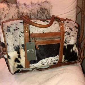 Cowhide duffle bag
